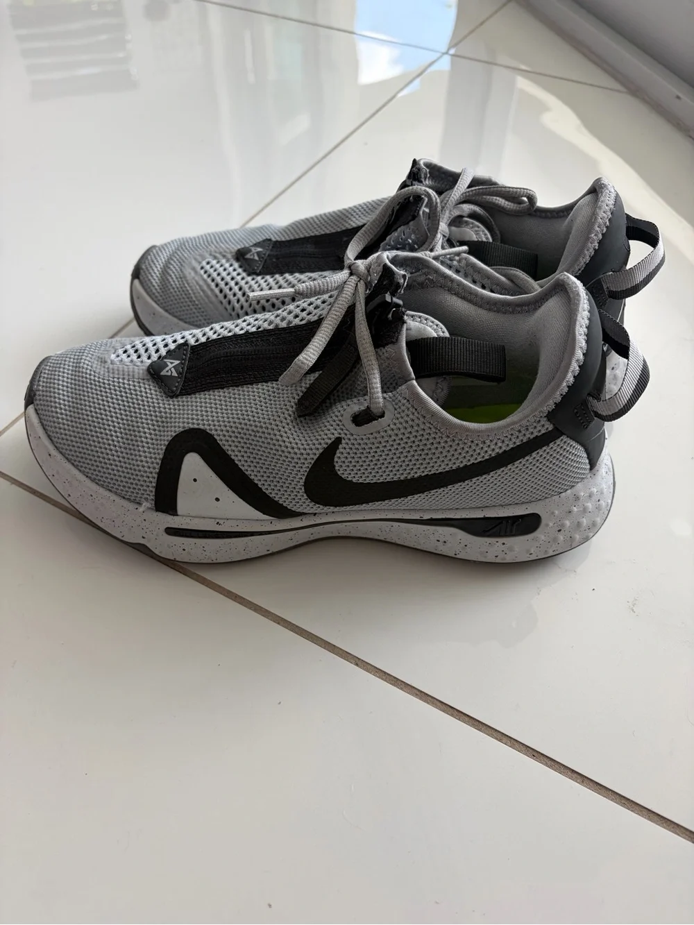 Nike Men’s Grey and Black basketball shoes